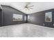 Large bedroom with high ceilings, tile floors, and windows for natural light at 6345 Strongbow Dr, Las Vegas, NV 89156