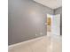 Bedroom with tile flooring and access to the laundry room at 6345 Strongbow Dr, Las Vegas, NV 89156