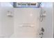 Bright bathroom features a white shower and tub combination with a sleek shower head fixture at 6345 Strongbow Dr, Las Vegas, NV 89156