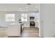 Modern kitchen featuring white cabinets, stainless steel appliances, and a large island at 669 Elliot Peak Ave, Las Vegas, NV 89183