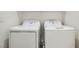 Laundry room with a side-by-side washer and dryer at 669 Elliot Peak Ave, Las Vegas, NV 89183