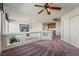 Upstairs loft area with carpet and natural lighting at 6695 Shadow Cove Ave, Las Vegas, NV 89139