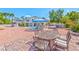 Charming backyard with outdoor dining under a gazebo and pool, perfect for Gathering gatherings at 6965 S Valley View Blvd, Las Vegas, NV 89118
