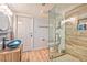 Modern bathroom with glass shower, stylish vanity, and trendy fixtures at 6965 S Valley View Blvd, Las Vegas, NV 89118