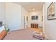 Well-lit primary bedroom with neutral decor, TV, and ample space for relaxation and comfort at 6965 S Valley View Blvd, Las Vegas, NV 89118