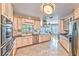 Spacious kitchen featuring stainless steel appliances, granite countertops, and ample cabinet space at 6965 S Valley View Blvd, Las Vegas, NV 89118