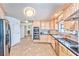 Well-lit kitchen features stainless steel appliances, and an open layout with neutral tones at 6965 S Valley View Blvd, Las Vegas, NV 89118