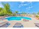Stunning backyard pool and cabana offering a private outdoor oasis with lounge chairs and beautiful landscaping at 6965 S Valley View Blvd, Las Vegas, NV 89118