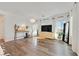 Spacious living room featuring hardwood floors, modern decor, and ample natural light from large windows at 7304 N Decatur Blvd # 6, North Las Vegas, NV 89131