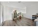 Bright and airy living space with wood flooring, a decorative plant, and neutral decor at 7304 N Decatur Blvd # 6, North Las Vegas, NV 89131