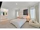 Cozy bedroom with neutral carpet, drapery, and an en-suite bathroom at 7304 N Decatur Blvd # 6, North Las Vegas, NV 89131