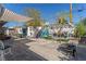 Expansive backyard featuring dining and lounge areas, perfect for entertaining at 813 Bonita Ave, Las Vegas, NV 89104