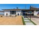 Inviting single-story home with modern landscaping and covered parking at 813 Bonita Ave, Las Vegas, NV 89104