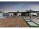 Charming single-story home featuring modern landscaping and a covered carport at 813 Bonita Ave, Las Vegas, NV 89104