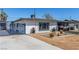 Charming single-story home with unique design elements and low-maintenance yard at 813 Bonita Ave, Las Vegas, NV 89104