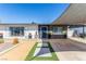 Contemporary home showcasing a desert-friendly yard and covered parking at 813 Bonita Ave, Las Vegas, NV 89104
