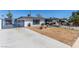 Cozy single-story home with drought-tolerant landscaping and modern carport at 813 Bonita Ave, Las Vegas, NV 89104