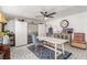 Bright living room with geometric tile, white-washed ceiling, and large artwork display at 813 Bonita Ave, Las Vegas, NV 89104