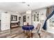 Inviting living room with dining area featuring stylish decor and natural light at 813 Bonita Ave, Las Vegas, NV 89104