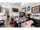 Bright home office featuring a large desk, ample storage, and views into the kitchen at 813 Bonita Ave, Las Vegas, NV 89104
