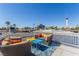 Inviting rooftop deck boasts comfortable seating and cityscape views, perfect for relaxation at 813 Bonita Ave, Las Vegas, NV 89104