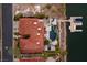Aerial view of a lakefront property with a private pool, dock, and boat lift at , Henderson, NV 89011