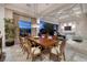 Open concept living and dining area with natural light and direct access to the backyard entertaining area at , Henderson, NV 89011