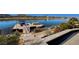 Waterfront home featuring a private boat dock with seating, and scenic lake views at , Henderson, NV 89011
