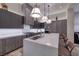 Contemporary kitchen boasts sleek cabinetry, a large island, and high-end stainless steel appliances at , Henderson, NV 89011