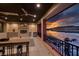 Relaxing outdoor patio with a fireplace, wet bar, and breathtaking sunset lake views at , Henderson, NV 89011