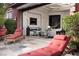 Outdoor patio with lounge chairs offering a view of the indoor living space and fireplace at , Henderson, NV 89011