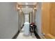 Modern powder room featuring a unique pedestal sink, stylish mirror, and elegant lighting fixtures at , Henderson, NV 89011