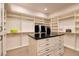 Spacious walk-in closet with a center island and ample storage at , Henderson, NV 89011