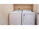 Functional laundry area equipped with a Whirlpool washer and dryer for convenient laundry care at 1073 Fishing St, Henderson, NV 89011