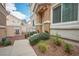Inviting front entrance featuring a well-maintained landscape and neutral toned exterior at 1156 Harts Bluff Pl # 3, Henderson, NV 89002