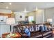 Comfortable living room with barstool seating and kitchen access in this modern layout at 1156 Harts Bluff Pl # 3, Henderson, NV 89002