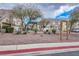 Community playground with mature landscaping, mulch ground cover, and seating at 1156 Harts Bluff Pl # 3, Henderson, NV 89002