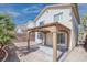 Backyard featuring concrete patio with a pergola, rock landscaping, and privacy fence at 1216 Padre Serra Ln, Las Vegas, NV 89134