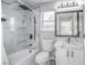 Bathroom with a black rain shower head and marble tile at 1216 Padre Serra Ln, Las Vegas, NV 89134