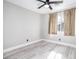 Comfortable bedroom featuring wood-look floors and sheer curtains at 1216 Padre Serra Ln, Las Vegas, NV 89134