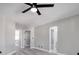 Bedroom features a ceiling fan, luxury vinyl plank flooring and gray walls at 1216 Padre Serra Ln, Las Vegas, NV 89134