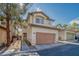 Charming two-story home with a two-car garage and well-maintained landscaping at 1216 Padre Serra Ln, Las Vegas, NV 89134