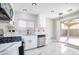 Modern kitchen with stainless steel appliances and plenty of counter space at 1216 Padre Serra Ln, Las Vegas, NV 89134