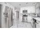 Modern kitchen with stainless steel appliances and white cabinets at 1216 Padre Serra Ln, Las Vegas, NV 89134