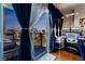 Balcony view featuring city skyline, desk, and drapes at 150 Las Vegas Blvd # 1014, Las Vegas, NV 89101