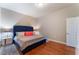 Cozy bedroom with a tufted blue headboard at 150 Las Vegas Blvd # 1014, Las Vegas, NV 89101