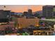 Urban cityscape view with high-rise buildings, including the Stratosphere, during sunset at 150 Las Vegas Blvd # 1014, Las Vegas, NV 89101