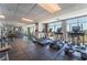 Modern gym with treadmills, elliptical machines, and extensive windows showcasing the cityscape at 150 Las Vegas Blvd # 1014, Las Vegas, NV 89101