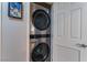 Convenient laundry room with stacked washer and dryer for efficient space utilization at 150 Las Vegas Blvd # 1014, Las Vegas, NV 89101
