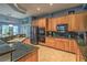 Updated kitchen features granite counters, stainless steel appliances, and ample cabinet space at 1532 Via Cassia, Henderson, NV 89052